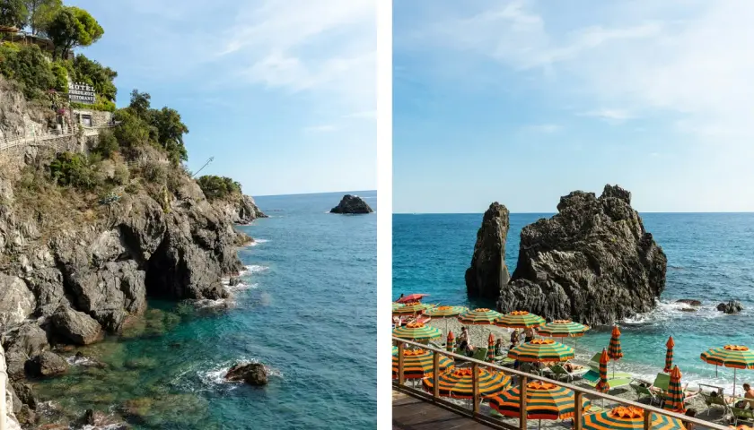 Vue panoramique de la côte rocheuse et de la plage animée de Cinque Terre, avec des parasols colorés et des formations rocheuses imposantes dans la mer.